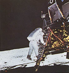 Figure 11. Astronaut Edwin E. Aldrin, Jr., Apollo 11 Lunar Module Pilot, stepping onto the lunar surface.