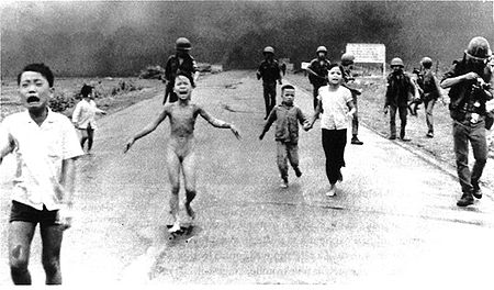 8 June 1972: Kim Phúc, center left, running down a road near Trang Bang after a South Vietnamese Air Force napalm attack.