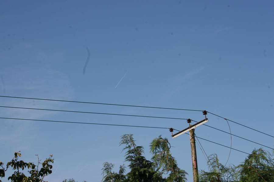 The contrail plane.  The chemtrail has completely gone by now due to the CBs and 18s.  The black mark is dust on the camera sensor!